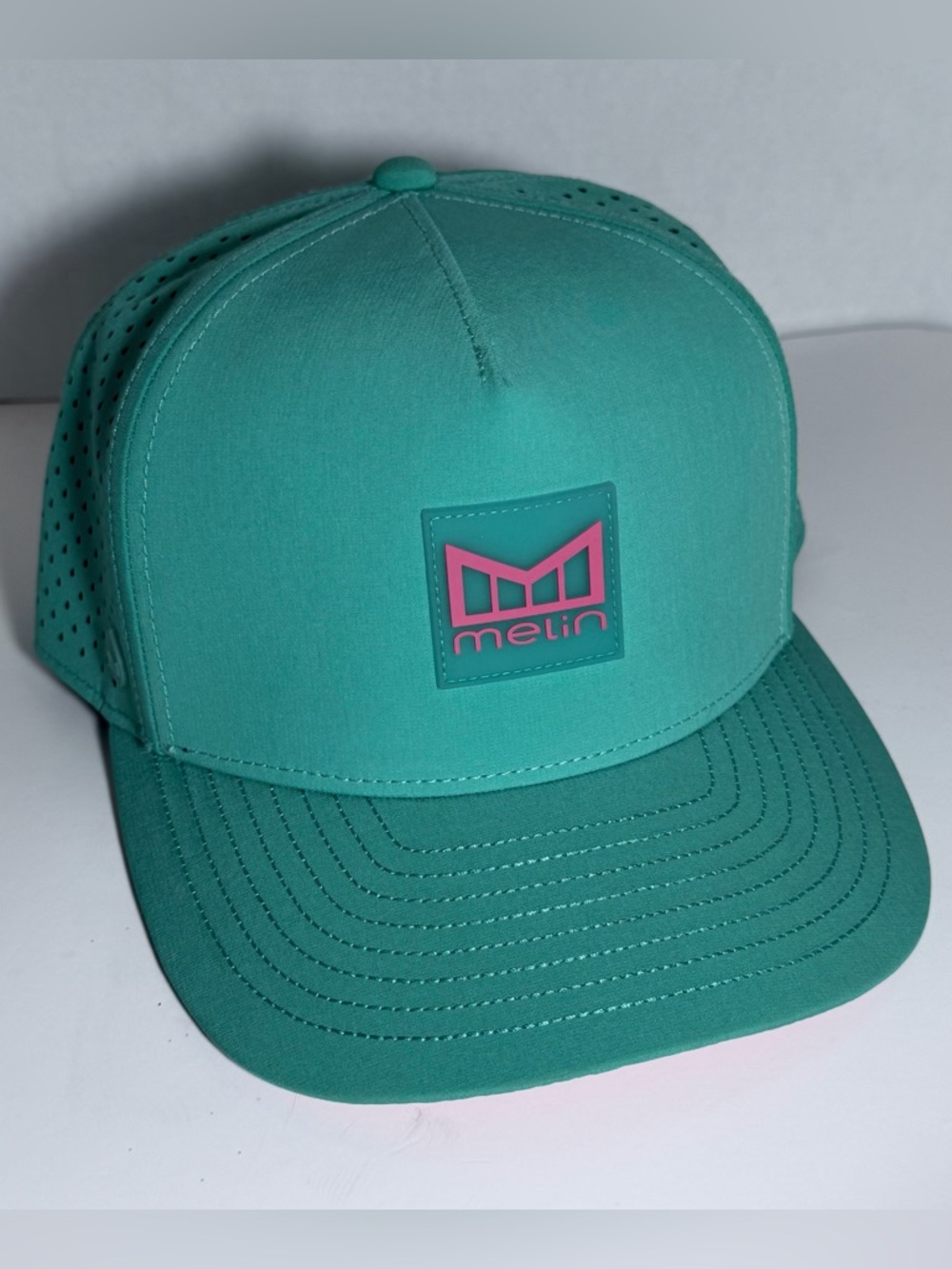 Melin Odysea Hydro Teal Snapback Hat with Pink Logo